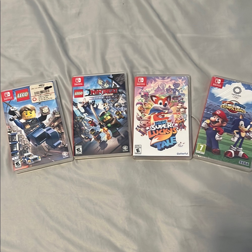 Nintendo Switch Game - Ninjago- Lego - Mario and sonic (new) - super lucky tale